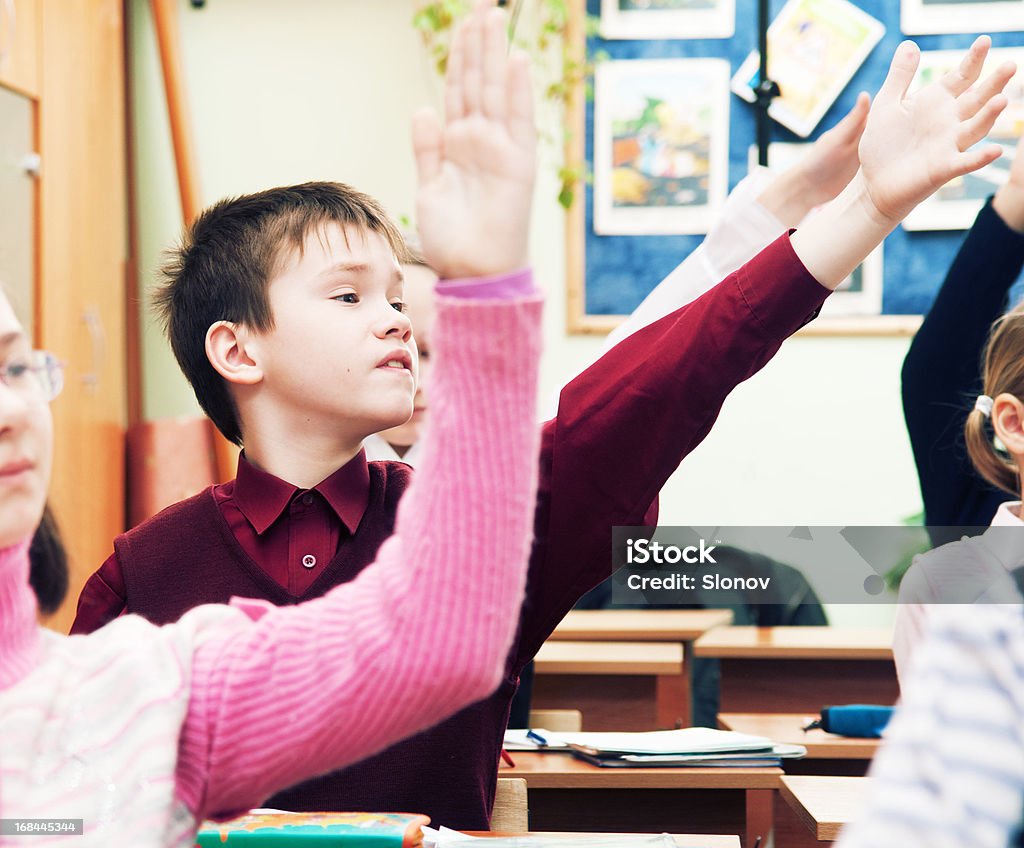 Lesson Boy raise hand up at lesson Answering Stock Photo