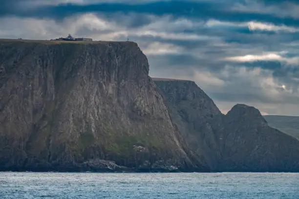 Photo of Nordkapp (North Cape), view froma ship, Troms of Finnmark, Norway. commonly referred to as the northernmost point of Europe