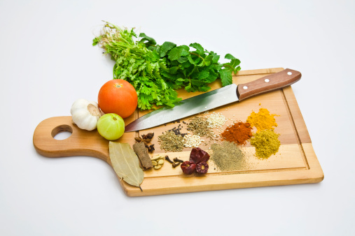 indian spices on cutting board.