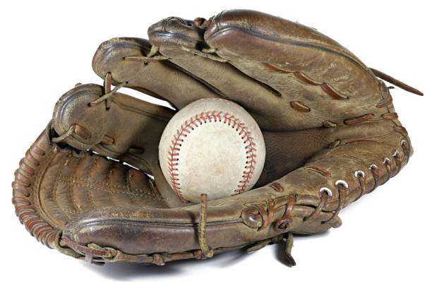 istock worn baseball and glove 1684488488
