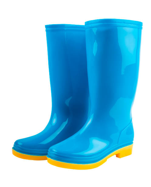 istock A Pair of blue and yellow rubber boots isolated on white background, Saved clipping path. 1684532110