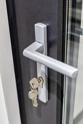 Modern metal door locks and key details