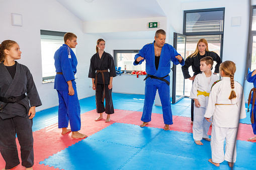 Group of children In Kimono Practice Real Aikido