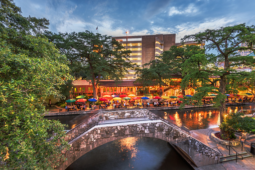 San Antonio, Texas, USA from the River Walk at dusk.