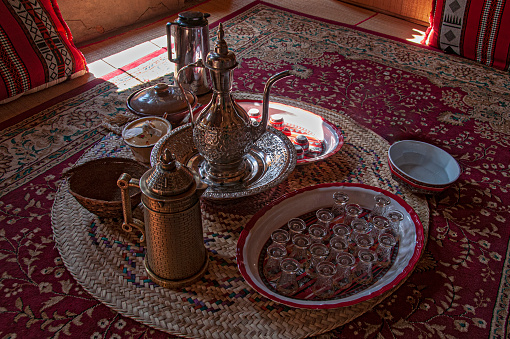You are welcome to settle down and be our guest. Invitation to the Arabic tea ceremony.