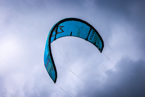 Virginia Beach, Virginia, USA - September 15, 2023: A kite surfers kite riding beautifully in the wind.