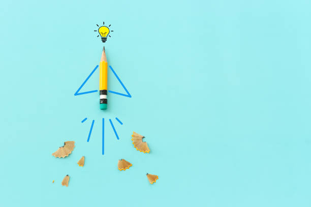 istock Concept image of pencil as rocket metaphor on blue background 1684660434