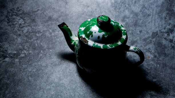 istock Iron teapot set on gray background 1684710647