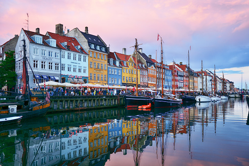 Nyhavn in Copenhagen is one of the most popular tourist places in dusk, Denmark