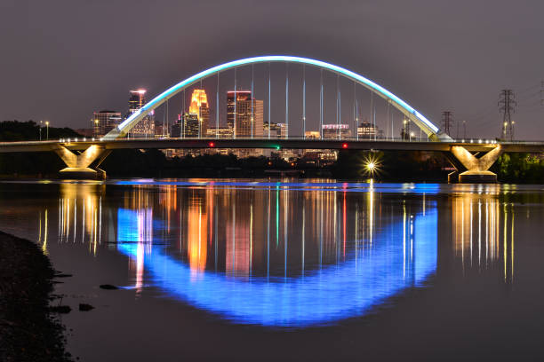 istock Lowry Avenue Bridge Lit at dusk in Minneapolis Minnesota 1684712571
