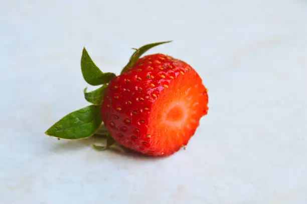 Close-up View Fresh Fruit Flesh Texture Of Strawberry Slices Arranged Horizontally Isolated On White Background
