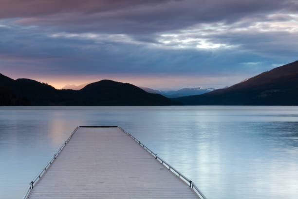 dock bei sonnenuntergang - flathead valley stock-fotos und bilder