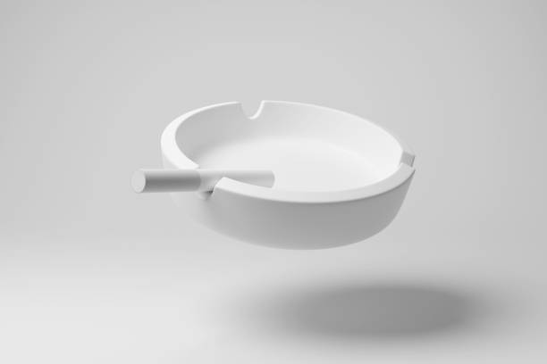 istock White cigarette on a ashtray floating in mid air on white background in monochrome and minimalism. Illustration of the concept of smoking habits and nicotine addiction 1684720391
