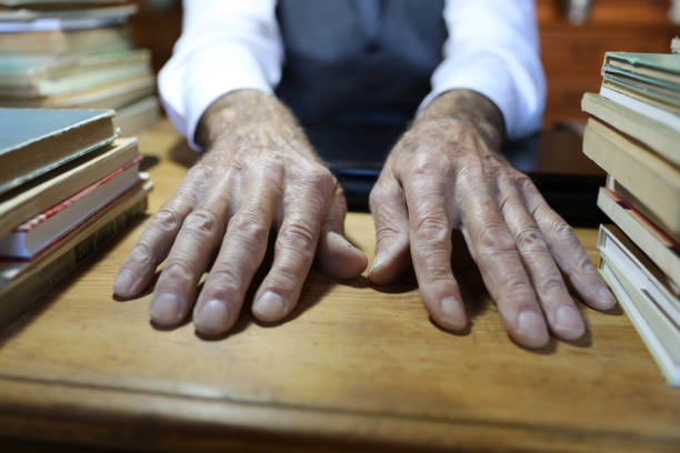 istock Elderly man with hands close up 1684729850
