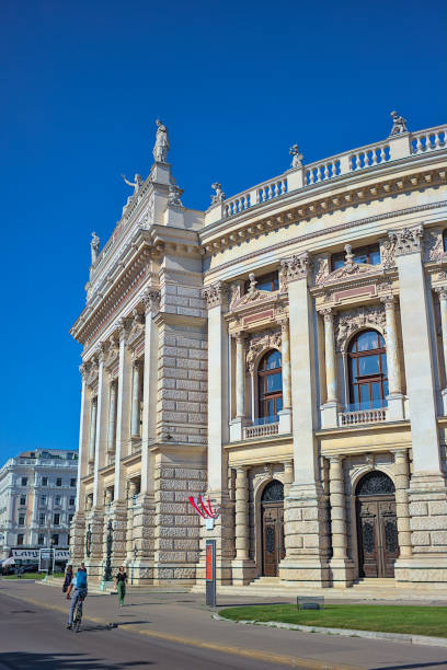 Famous Vienna Burgtheater - National theater in the city. Vienna, Austria - June 29, 2023: Famous Vienna Burgtheater - National theater in the city. Typical Baroque Austro-Hungarian facade. Popular tourist attraction. burgtheater vienna stock pictures, royalty-free photos & images