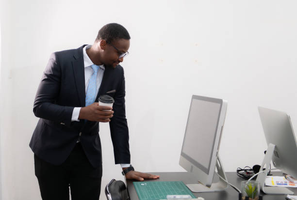 istock Young african american business man working at modern office with computer 1684742527