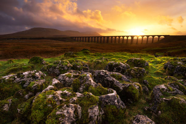 istock Dramatic Ribblehead Viaduct Sunset with Limestone Pavement, Yorkshire Dales, UK. 1684747072