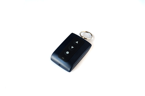 electronic remote control for garage or parking gate control. keychain for car keys