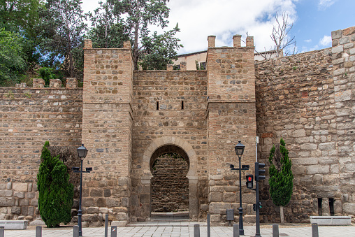 View of a fortified wall and  a door at Toledo city, Spain.