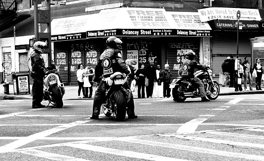 Harlem, Manhattan, New York City, USA - May 22nd 2011: People looking at bikers between 125th and Malcom X Boulevard.