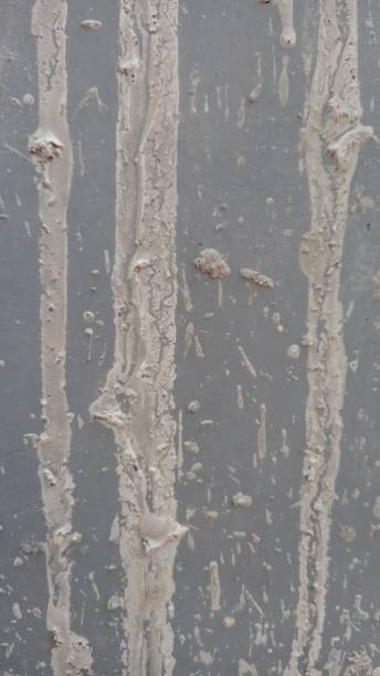 istock The background is a gray wall with cement splashes 1684776230