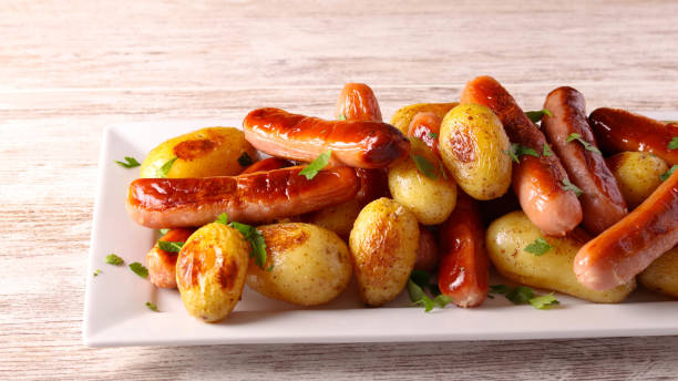 istock Roast sausages and potatoes 1684797780