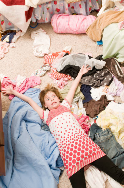 istock Girl in bedroom messiness 168479835