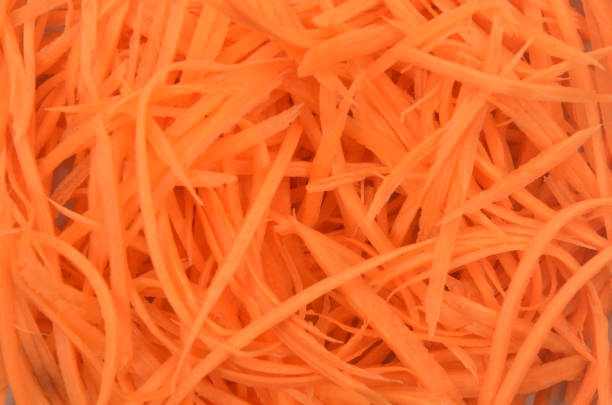 istock background of grated carrots close-up 1684803155