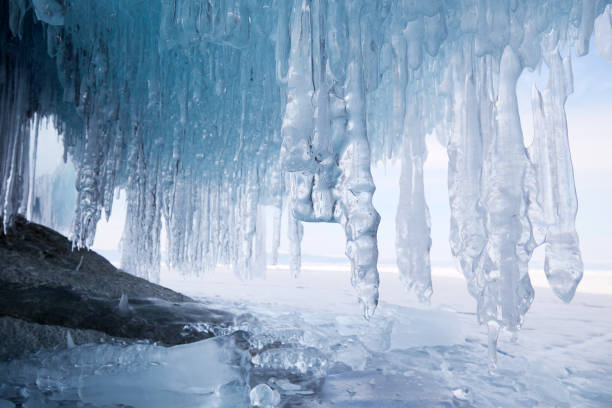 istock Winter natural background. Icicles hanging from the rocks 1684822908