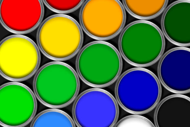 istock Mulit colored tins of paint in rows against black 168482982