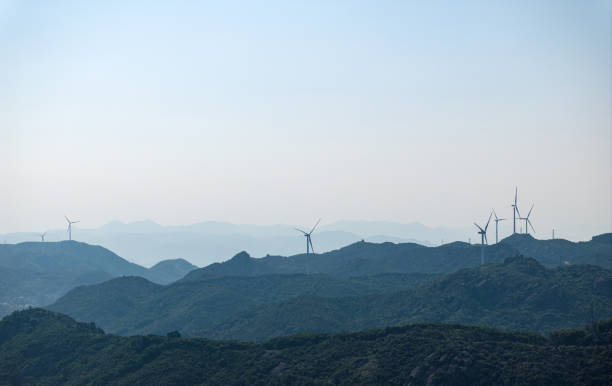 A wind farm overlooking the top of the mountain