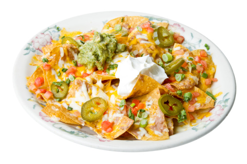 Nacho Platter with cheese, guacamole, sour cream, chips, jalapenos and onions