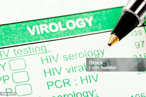 Photo libre de droit de Stylo Sur Virology Formulaire Pour Les Tests Concernant Le Vih Sida banque d'images et plus d'images libres de droit de Virus HIV