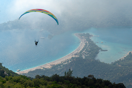 Paraglider flying in Ölüdeniz town of Fethiye, Turkey.