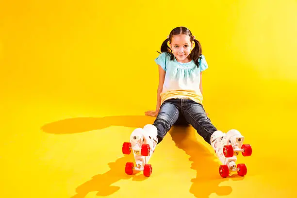 Photo of Beautiful Young Girl on Roller Skates