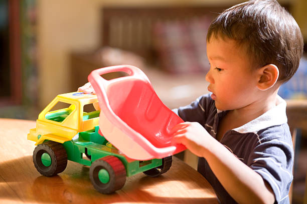 istock Child playing with toy car 168492972