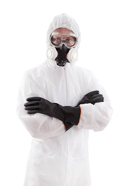 schutz- und arbeitskleidung - protective suit stock-fotos und bilder