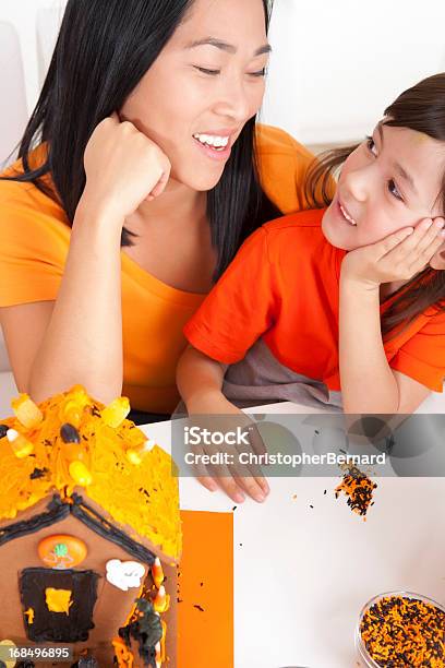 Mother And Daughter Celebration Halloween Stock Photo - Download Image Now - 25-29 Years, 30-34 Years, 6-7 Years