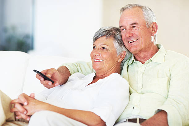 istock Relaxed senior couple watching television 168497060