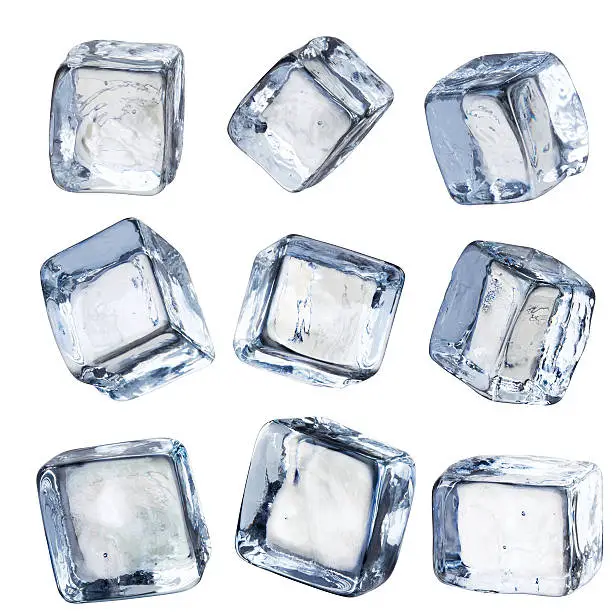 Nine ice cubes at various perspectives  - each cube has it's own separate clipping path. Shot with a Canon 5D Mark II and composed in Photoshop.