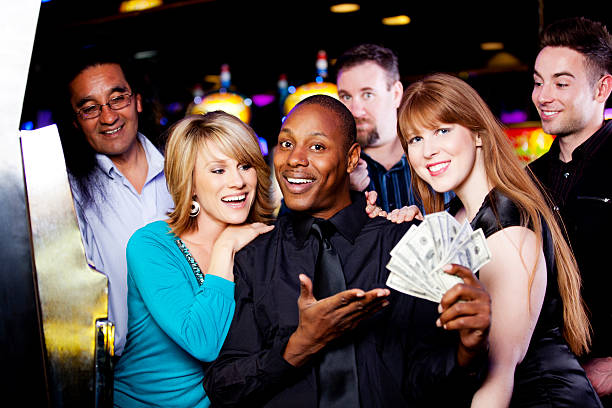 istock Winner: large group of happy diverse people celebrating a win 168499883