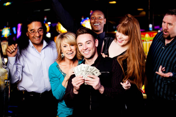 istock Winner: large group of happy diverse people celebrating a win 168499916