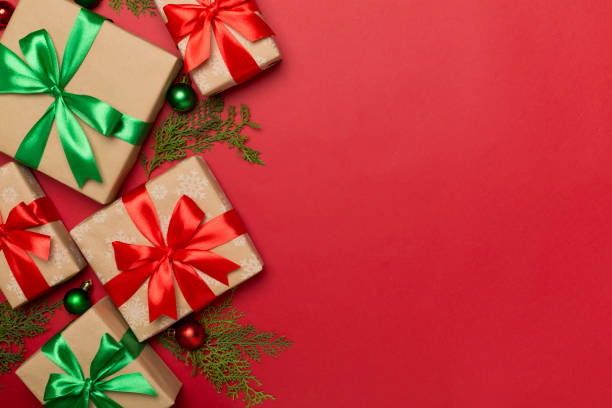 istock Gift boxes with decor on color background, top view 1685021242