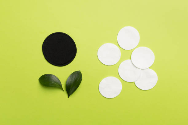 istock Reusable cotton pads with disposable ones on color background, top view 1685044922