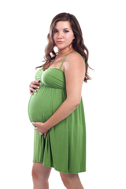 istock Pregnant Woman on White Background 168504520