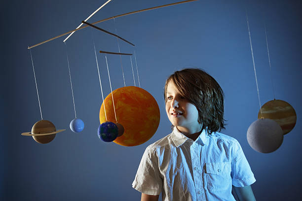 Kids Amp Science Homemade Solar System Studio Stock Photo - Download Image  Now - Hanging Mobile, Planet - Space, Child - iStock