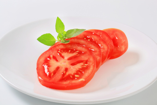 Sliced tomato on a plate