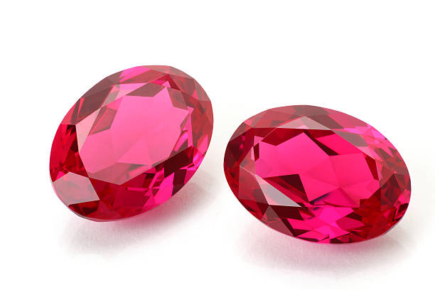 Pair of Ruby Pair of Oval Cut Ruby on White Back Ground. garnet stock pictures, royalty-free photos & images