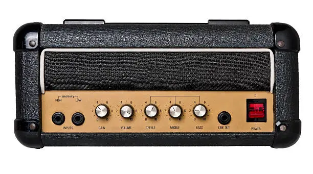 Vintage guitar amplifier head isolated on white.