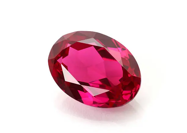 Ruby gemstone isolated on white. 